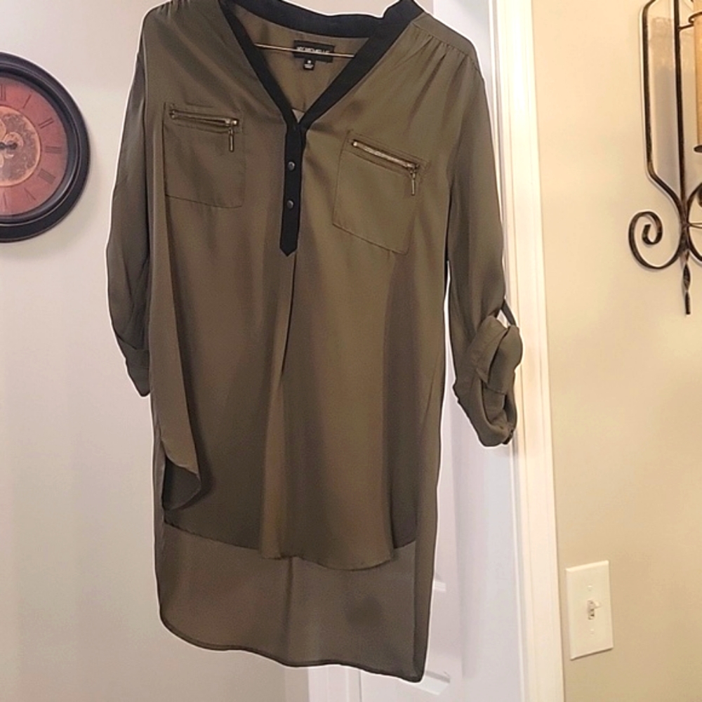A casual green and black blouse
